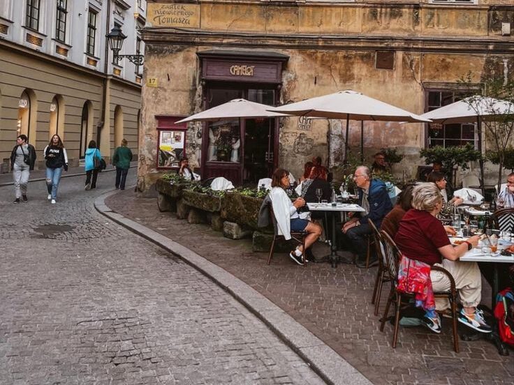 Krakow's Old Town with historic buildings, St. Mary's Basilica, and bustling Market Square in Poland